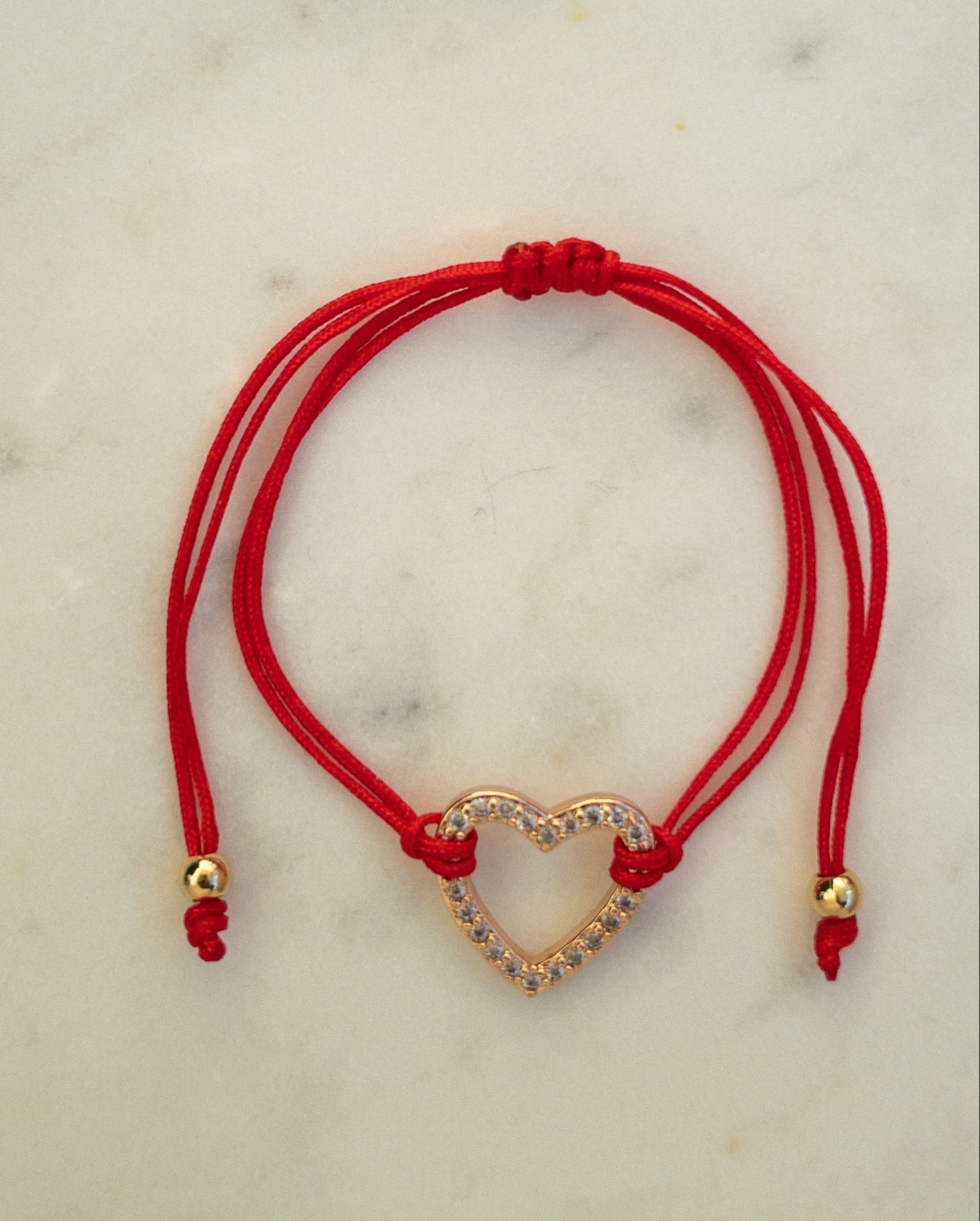 PULSERA CORAZÓN PROFUNDO ROJA CON CORAZÓN DE CIRCONITAS